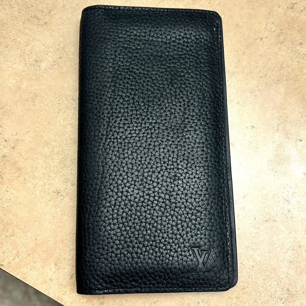 Black leather tri fold wallet
